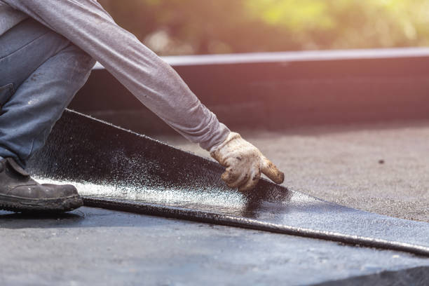 Professional Basement Waterproofing technician working in Clyde, NY